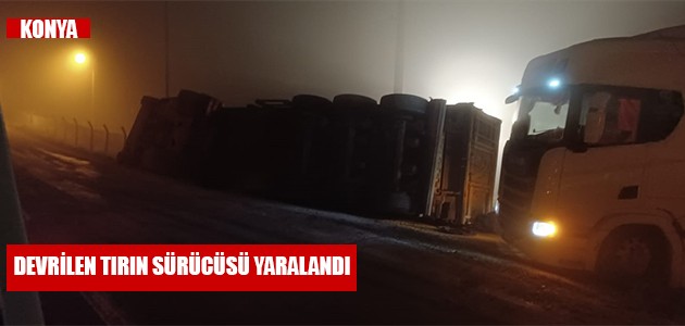  DEVRİLEN TIRIN SÜRÜCÜSÜ YARALANDI 